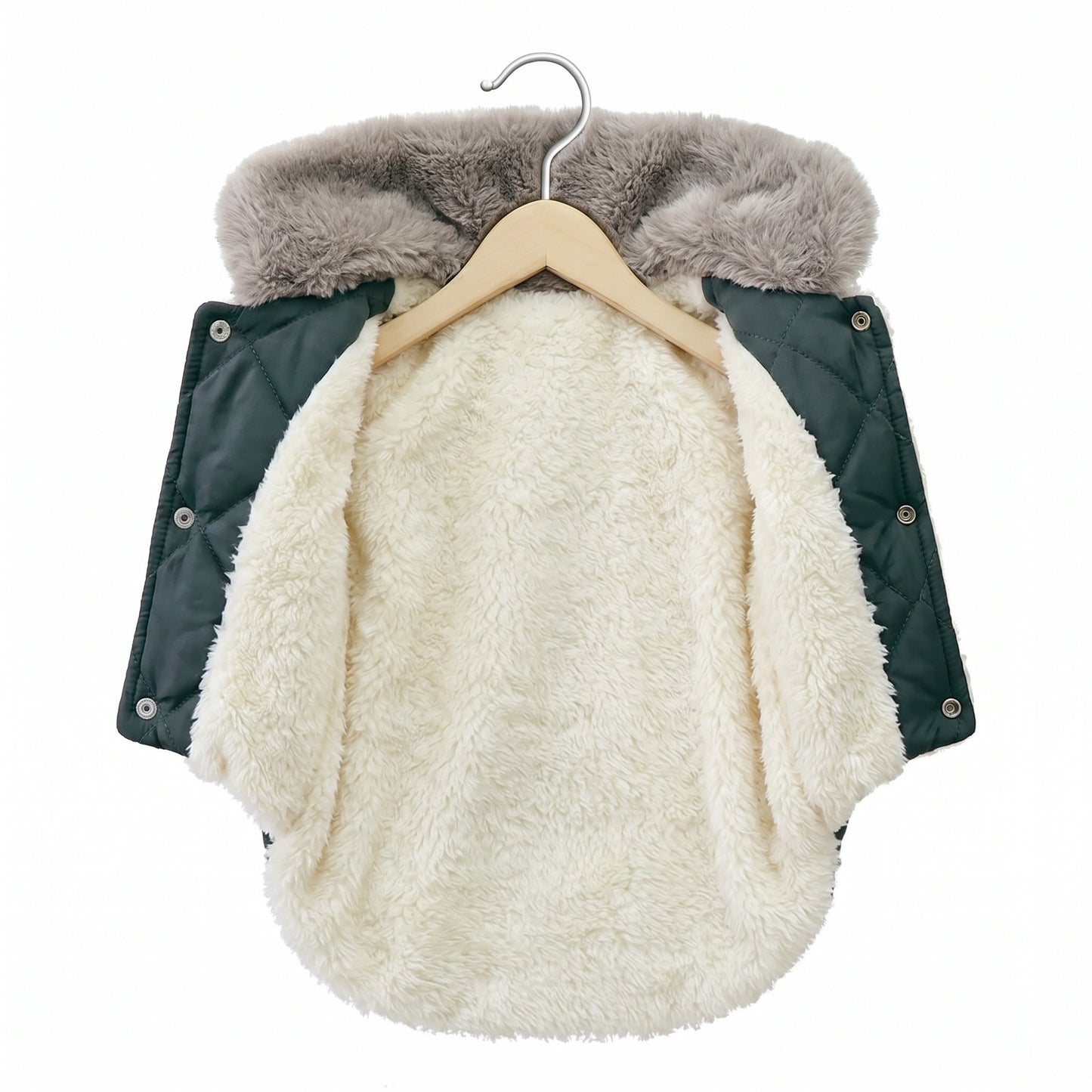 Children's vest with fur lining on a hanger against a white background