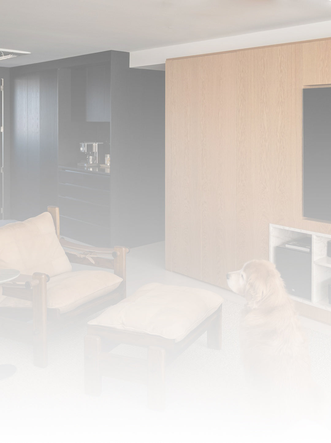 Modern office space with glass walls and neutral color scheme