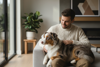 Man with Australian Shepherd