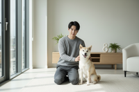 Man with Shiba Inu