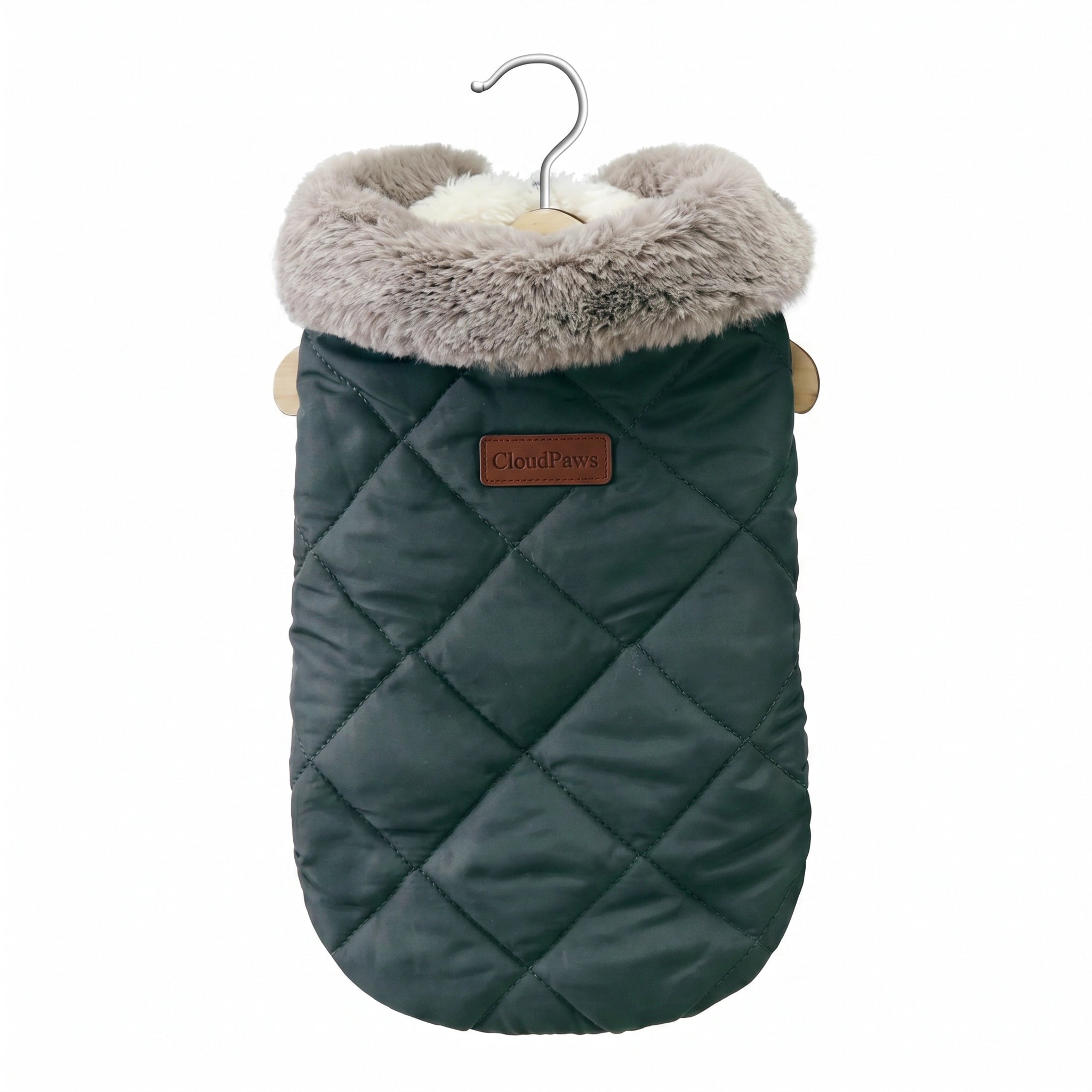 Green quilted dog coat with fur-lined hood on a white background